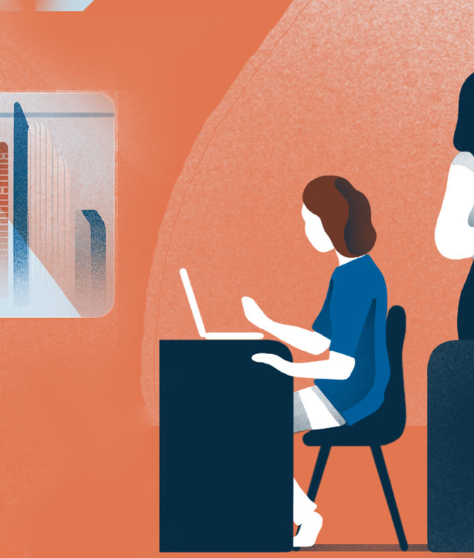 Women sat on a laptop at a desk